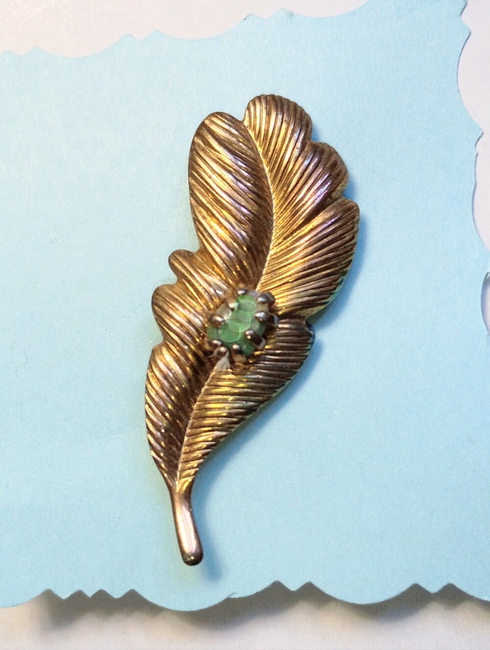 Goldtone Textured Feather Brooch w/ Jade Stone